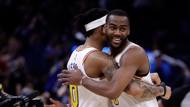 Alec Burks and D'Angelo Russell, The Canadian Press Alec Burks and D'Angelo Russell