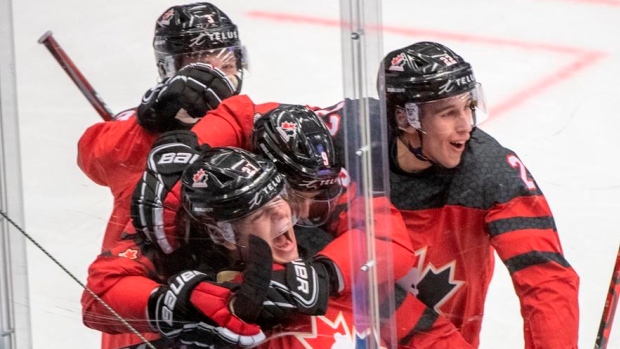 Canadian juniors celebrate, The Canadian Press Canadian juniors celebrate