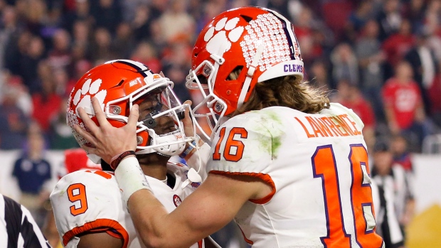 Travis Etienne and Trevor Lawrence
