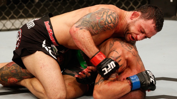 Frankie Edgar and Cub Swanson, Josh Hedges/Zuffa LLC/UFC/Getty Images Frankie Edgar and Cub Swanson