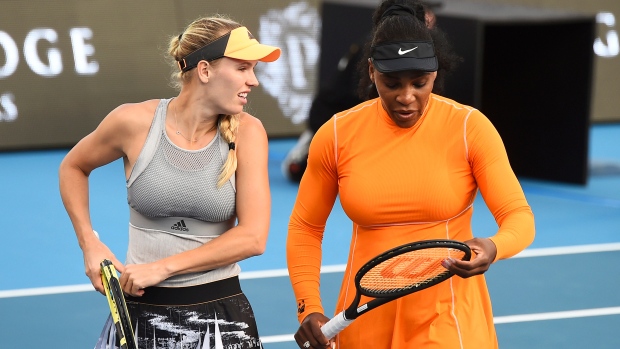 Caroline Wozniacki and Serena Williams , The Canadian Press Caroline Wozniacki and Serena Williams