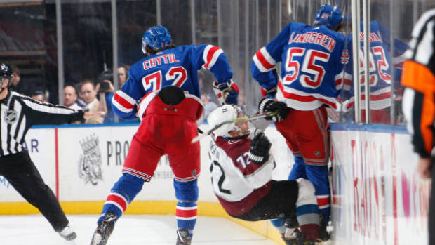 Ryan Lindgren hits Donskoi, Getty Images Ryan Lindgren hits Donskoi