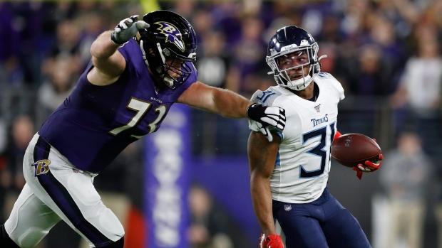 Ravens' Marshal Yanda says Titans' Jeffrey Simmons spit in his face 