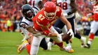 Travis Kelce (87) and Lonnie Johnson Jr. (32)
