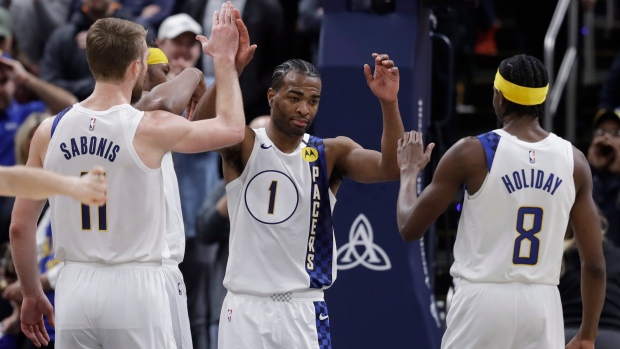Domantas Sabonis T.J. Warren Aaron Holiday, The Canadian Press Domantas Sabonis T.J. Warren Aaron Holiday