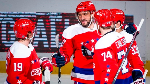 Alex Ovechkin celebrates with teammates 