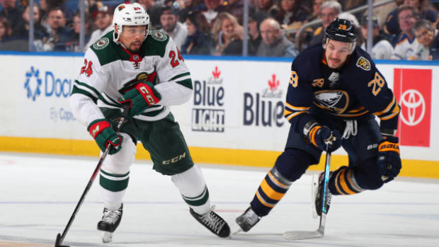 Matt Dumba and Zemgus Girgensons