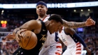 Kyle Lowry drives to the net against Wizards guard Isaiah Thomas Friday.