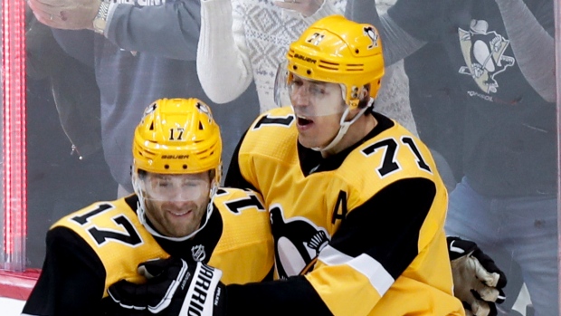 Bryan Rust and Evgeni Malkin 