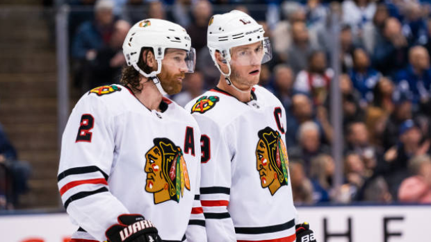 Duncan Keith, Jonathan Toews, Getty Images Duncan Keith, Jonathan Toews