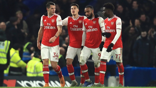 Arsenal celebrates, The Canadian Press Arsenal celebrates