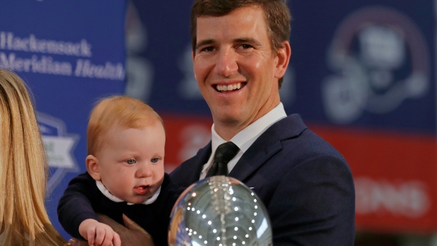Eli Manning, The Canadian Press Eli Manning