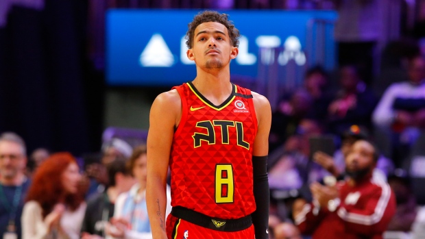 trae young gold jersey