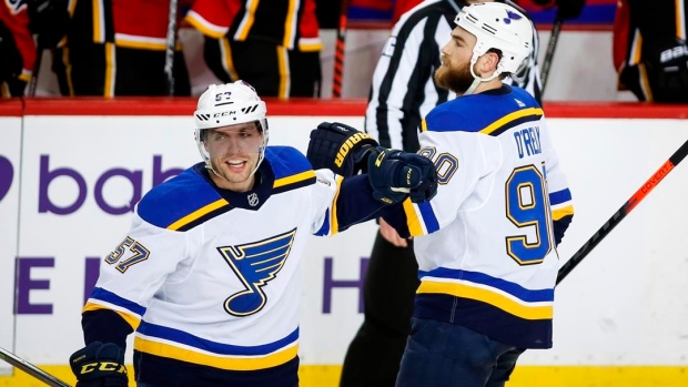 Ryan O'Reilly, right, celebrates with David Perron