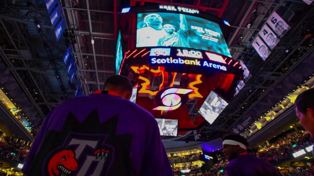 Members of the Raptors pause for a moment of silence during a tribute to Kobe Bryant Tuesday.