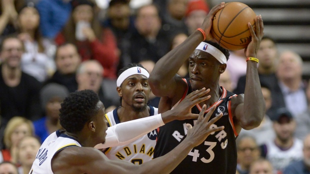 Raptors forward Pascal Siakam battles Pacers centre Myles Turner Wednesday.