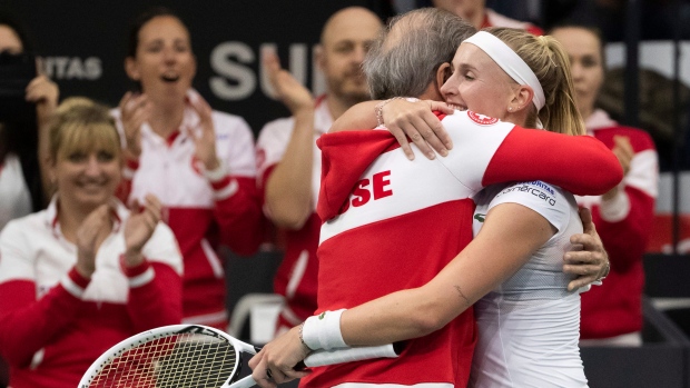 Switzerland's Jil Teichmann celebrates, The Canadian Press Switzerland's Jil Teichmann celebrates