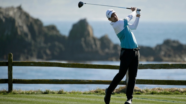 Nick Taylor follows his drive Friday in Pebble Beach, Calif., The Canadian Press Nick Taylor follows his drive Friday in Pebble Beach, Calif.