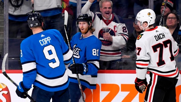 Andrew Copp Kyle Connor Kirby Dach, The Canadian Press Andrew Copp Kyle Connor Kirby Dach