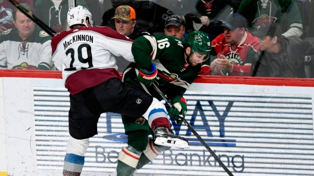 MacKinnon hits Zucker, The Canadian Press MacKinnon hits Zucker