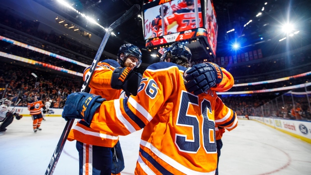 Adam Larsson and Kailer Yamamoto , The Canadian Press Adam Larsson and Kailer Yamamoto