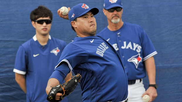 Blue Jays pitcher Hyun-Jin Ryu throws during Thursday's workout in Dunedin, Fla., The Canadian Press Blue Jays pitcher Hyun-Jin Ryu throws during Thursday's workout in Dunedin, Fla.
