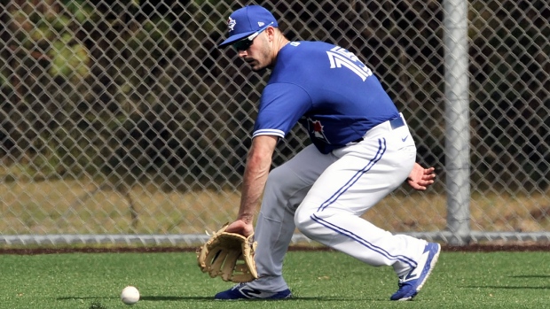 Blue Jays outfielder Randal Grichuk reaches for a grounder on Monday., The Canadian Press Blue Jays outfielder Randal Grichuk reaches for a grounder on Monday.