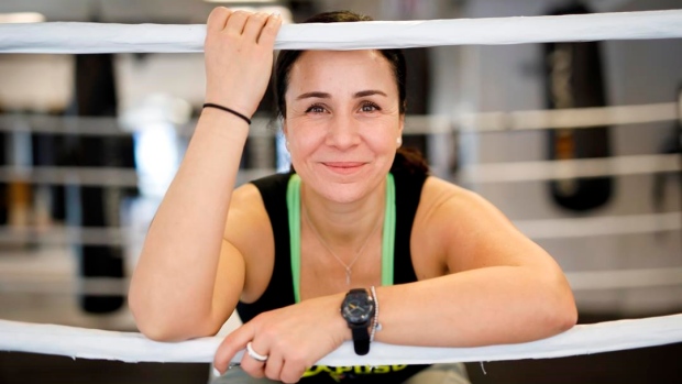 Raposo fashioned her love of boxing into career as rare female ring announcer Article Image 0