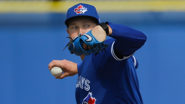 Blue Jays' Nate Pearson delivers a pitch at spring training on Friday.