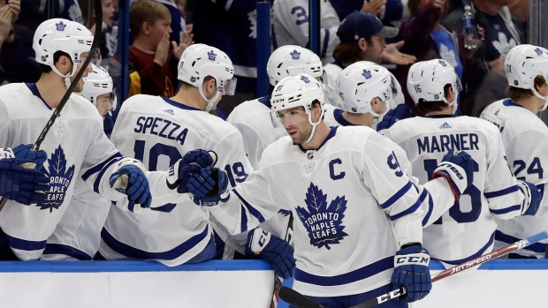 John Tavares (91) celebrates with Toronto Maple Leafs bench