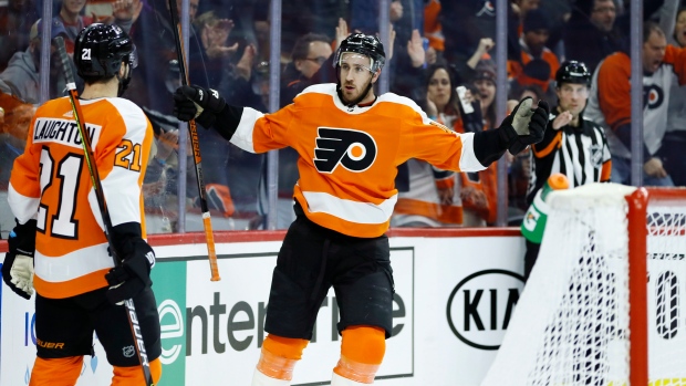 Kevin Hayes (13) celebrates with Scott Laughton (21), The Canadian Press Kevin Hayes (13) celebrates with Scott Laughton (21)