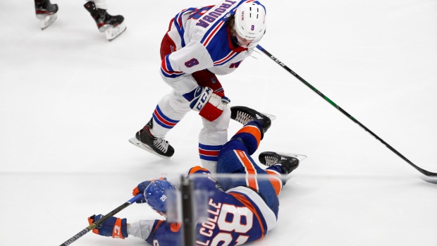 Jacob Trouba shows importance to Rangers in fight-night overtime
