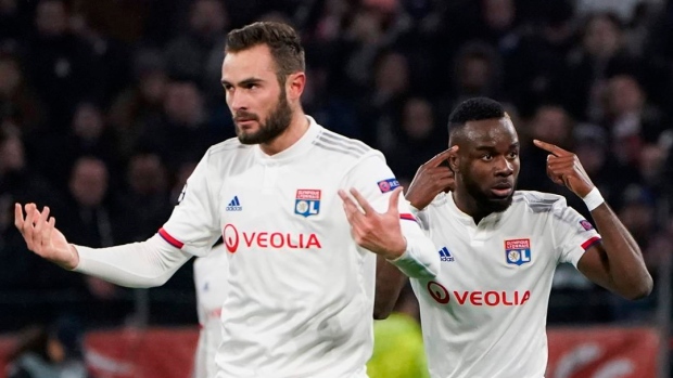 Lyon's Maxwel Cornet and Lucas Tousart, The Canadian Press Lyon's Maxwel Cornet and Lucas Tousart