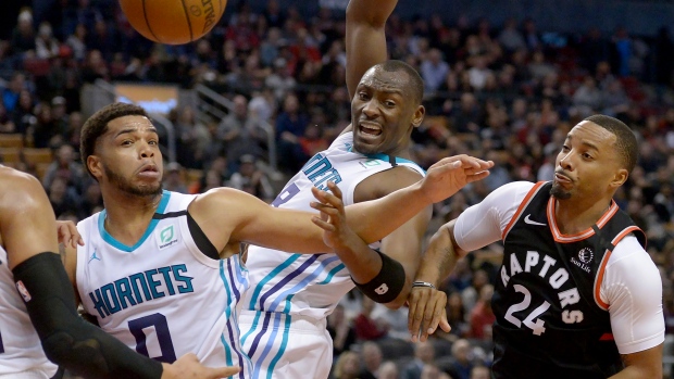 Miles Bridges, Bismack Biyombo and Norman Powell