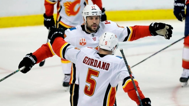 Milan Lucic Mark Giordano, The Canadian Press Milan Lucic Mark Giordano