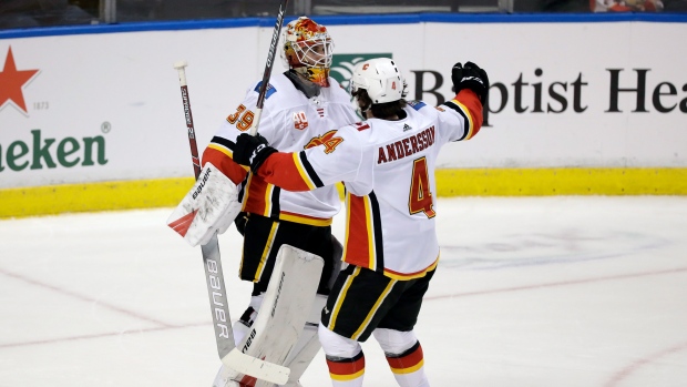 Rasmus Andersson and Cam Talbot 