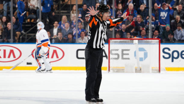 NHL referee signals no goal