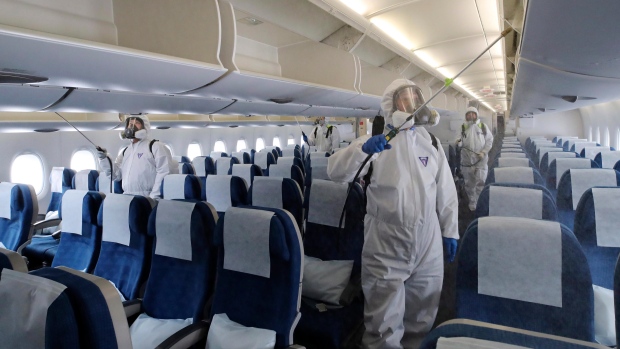 COVID-19 precautions on plane, The Canadian Press COVID-19 precautions on plane