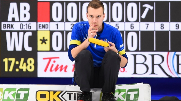 Alberta skip Brendan Bottcher visualizes a shot against Team Wild Card on Friday night., The Canadian Press Alberta skip Brendan Bottcher visualizes a shot against Team Wild Card on Friday night.