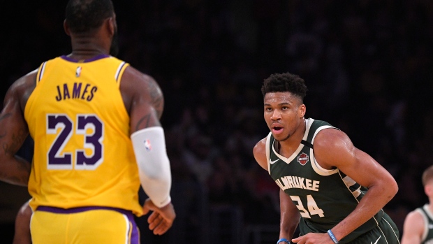 Giannis Antetokounmpo and LeBron James, The Canadian Press Giannis Antetokounmpo and LeBron James
