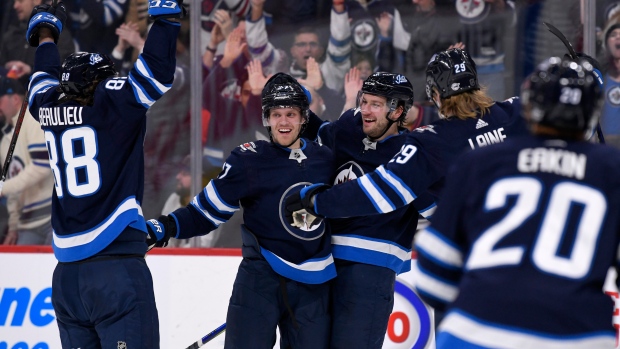 Winnipeg Jets celebrate, The Canadian Press Winnipeg Jets celebrate