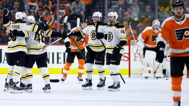 Matt Grzelcyk, Bruins celebrate, The Canadian Press Matt Grzelcyk, Bruins celebrate
