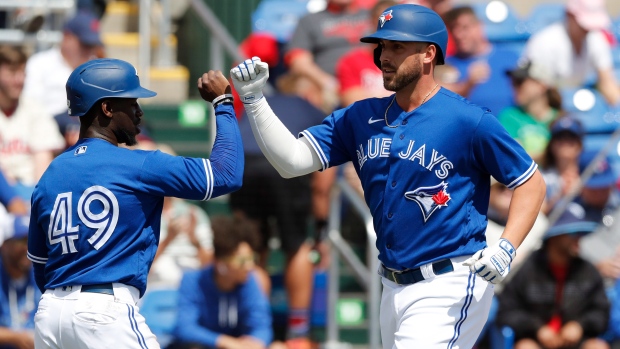 Travis Shaw, right, The Canadian Press Travis Shaw, right