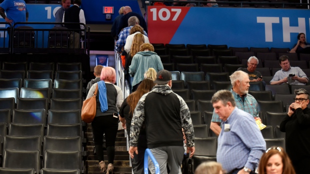 Basketball fans leave Chesapeake Energy Arena