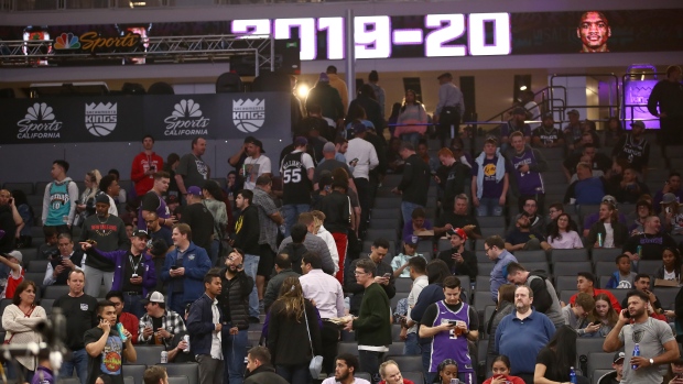 Sacramento Kings fan exiting arena