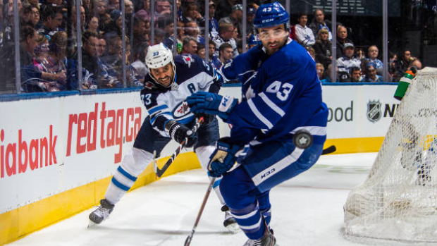 Dustin Byfuglien and Nazem Kadri, Getty Images Dustin Byfuglien and Nazem Kadri