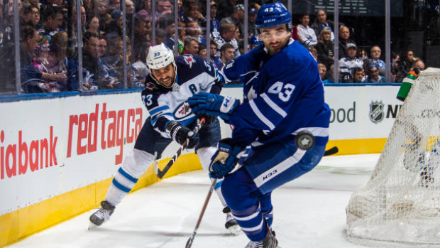 Dustin Byfuglien and Nazem Kadri