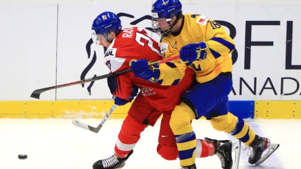 Adam Raska, left, Lucas Raymond, Peter Kovalev\TASS via Getty Images Adam Raska, left, Lucas Raymond
