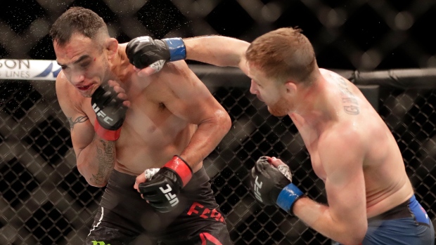Justin Gaethje punches Tony Ferguson Justin Gaethje punches Tony Ferguson