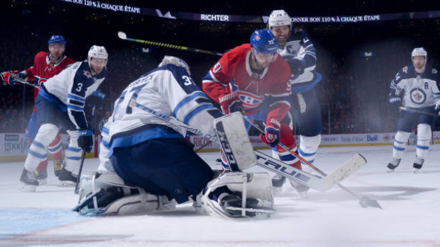 Tatar tries to score on Hellebuyck, Getty Images Tatar tries to score on Hellebuyck